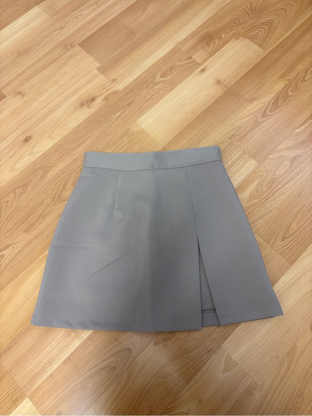Mini Skirt with Front Pleat from Korea